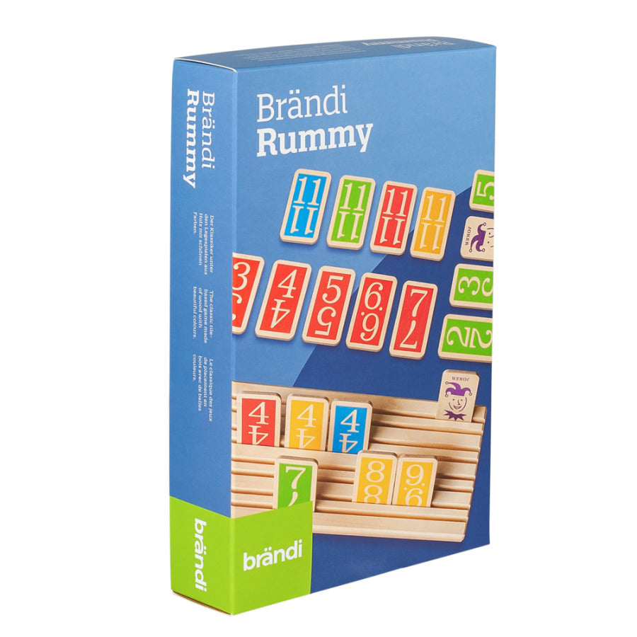 Brändi Rummy Verpackung Vorderseite - Originalverpackung Zahlenspiel blau-grün mit bunten Spielsteinen - Swiss Quality Familienspiel seit 1968